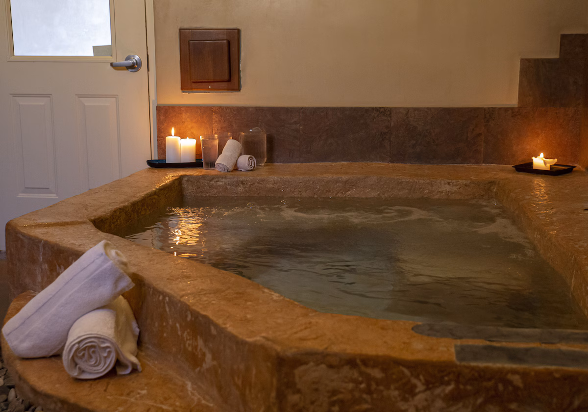Guests can enjoy a complimentary 30-minute mineral soak daily in one of four private tubs.