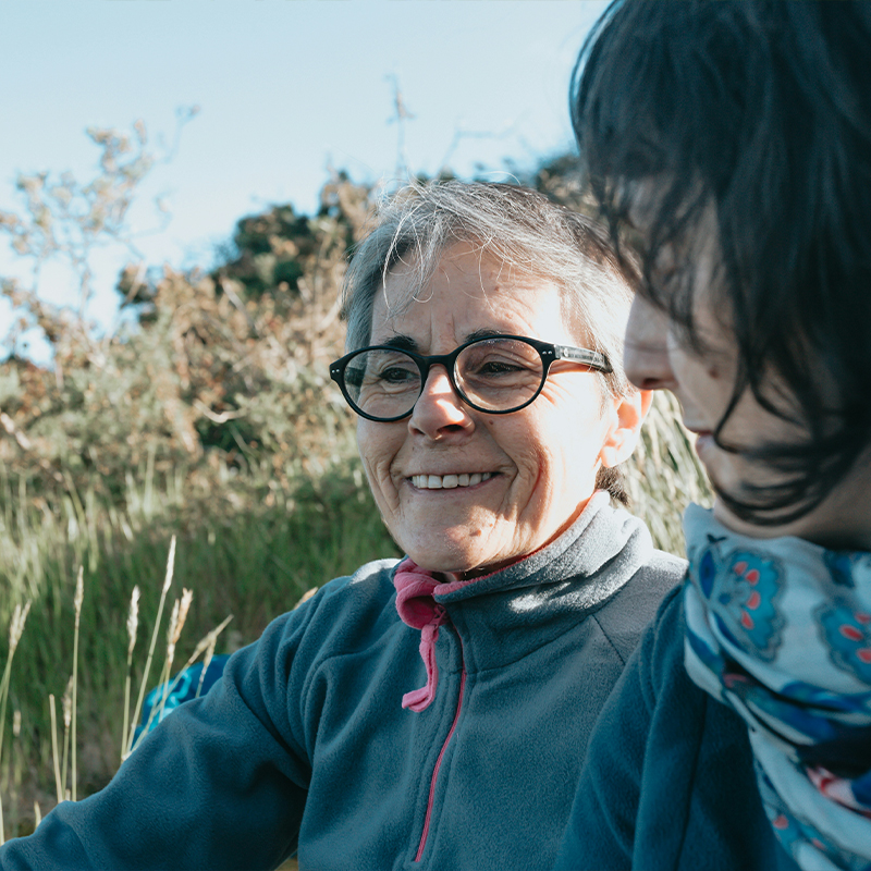 Two women outdoors. Clean Slate Clients.