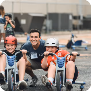 Children on bikes at camp skylark