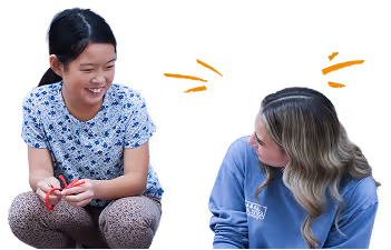 Two happy people talking to each other at camp skylark