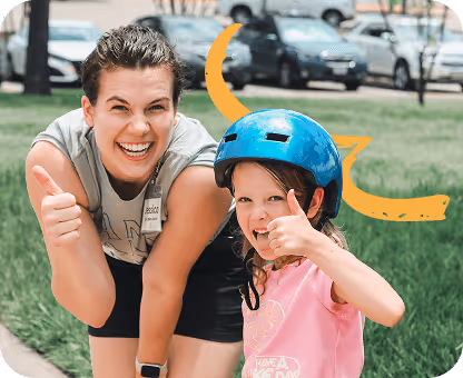 Happy counselor and child thumbs up