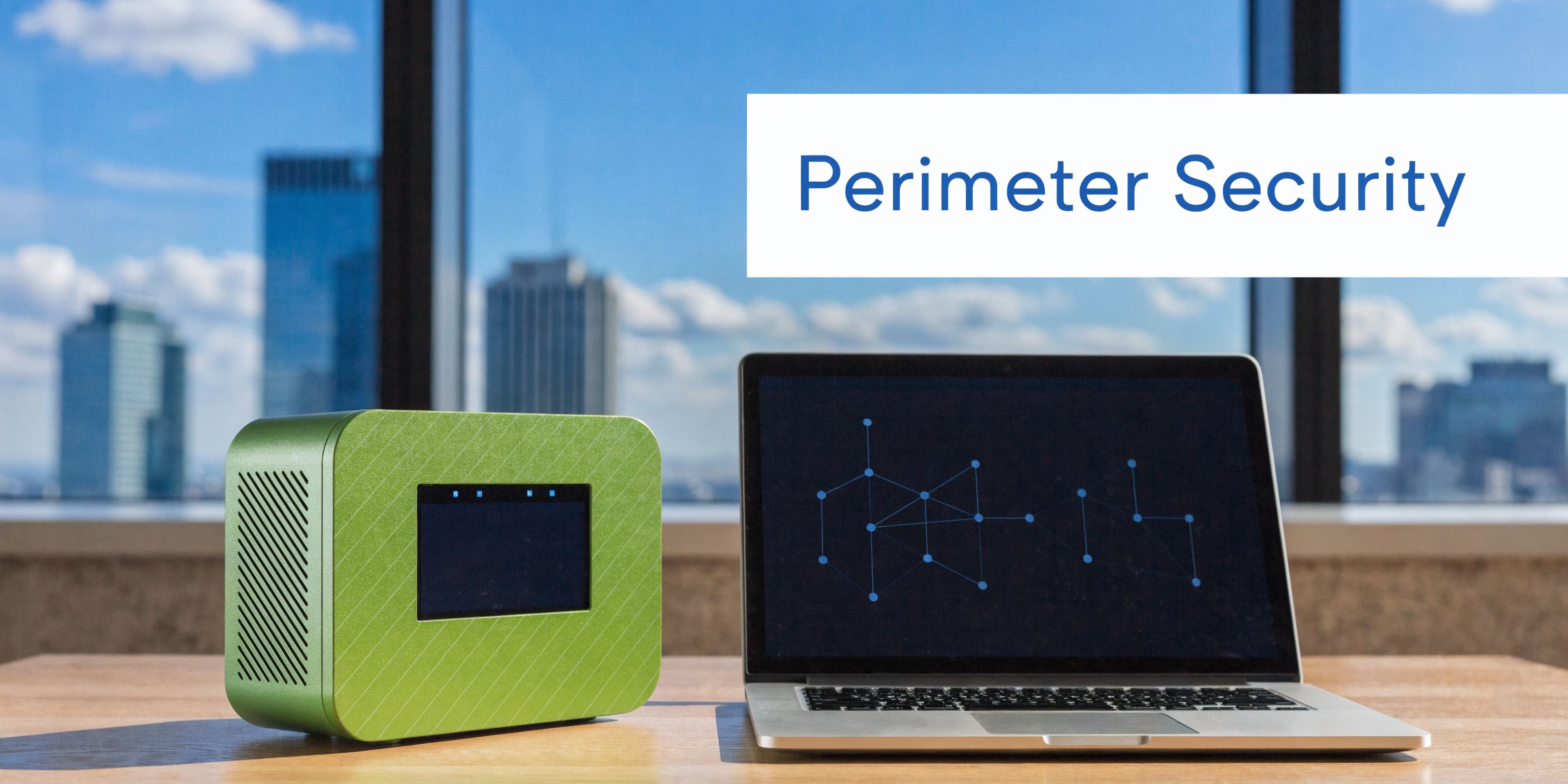 A modern green network security hardware device sits next to a laptop displaying a digital network graph.