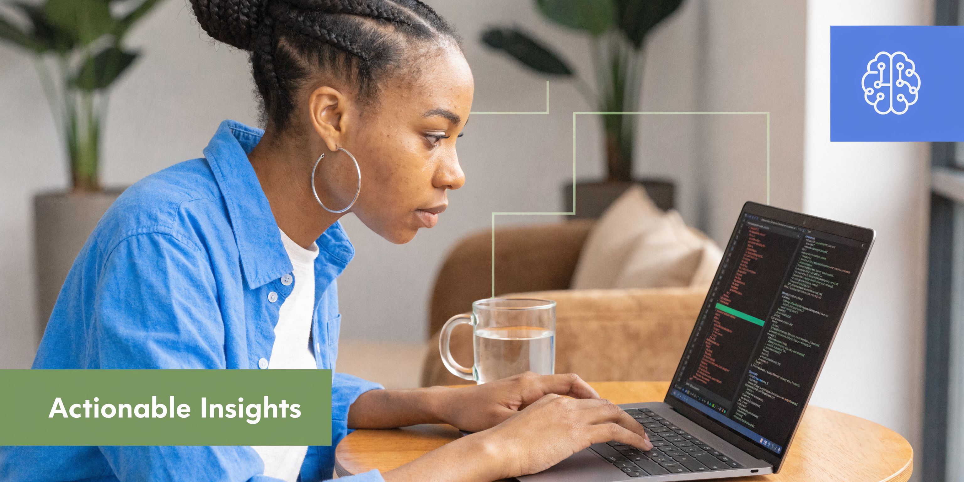 A woman working on a laptop with code displayed on the screen at a wooden table.