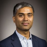 man looking at camera and smiling