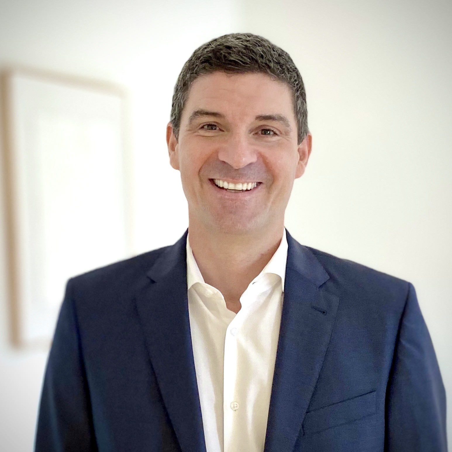 man looking at camera and smiling