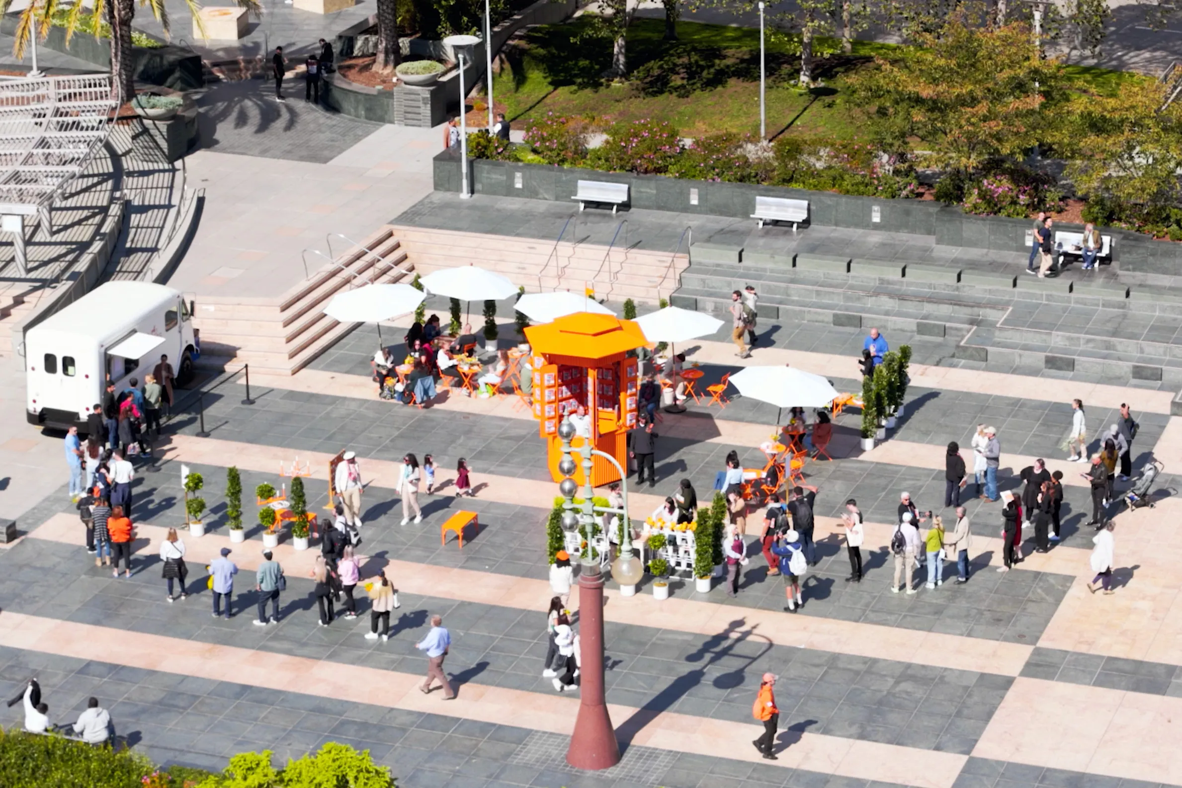 Create a San Francisco garden party in high-traffic locations to promote the latest issue of Le Monde d’Hermès.
