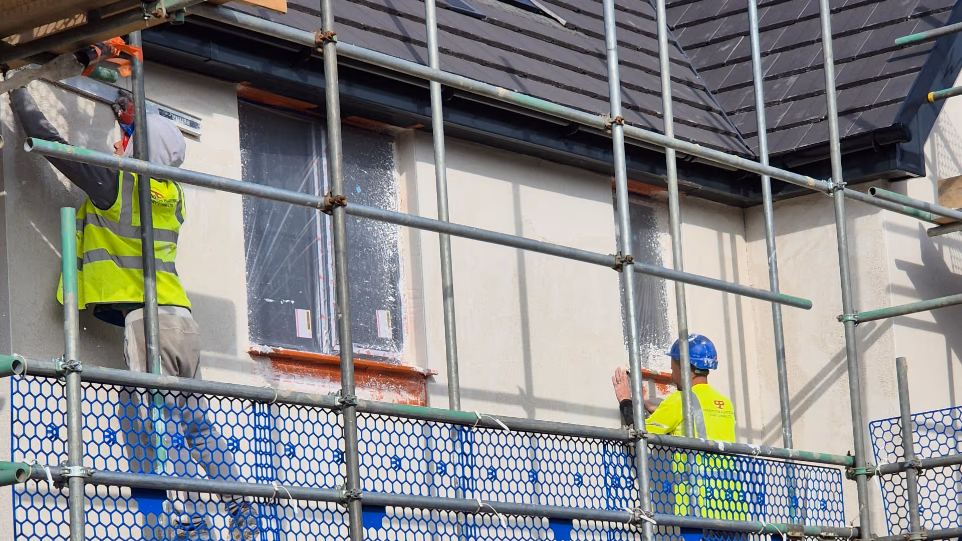 Labourers on scaffolding working for Paddington