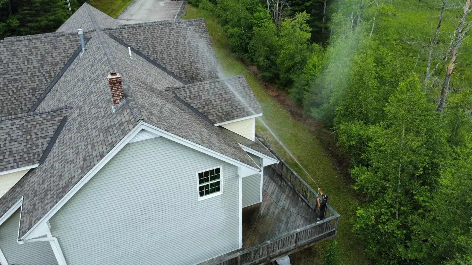 Aerial view of soft wash roof cleaning in New Hampshire