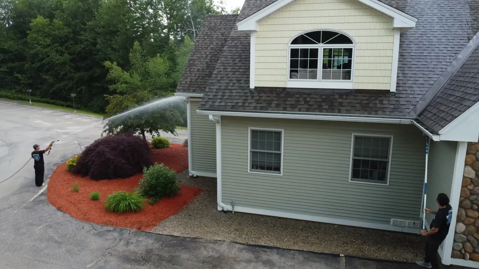 Aerial view of a freshly soft-washed home exterior in Seacoast NH