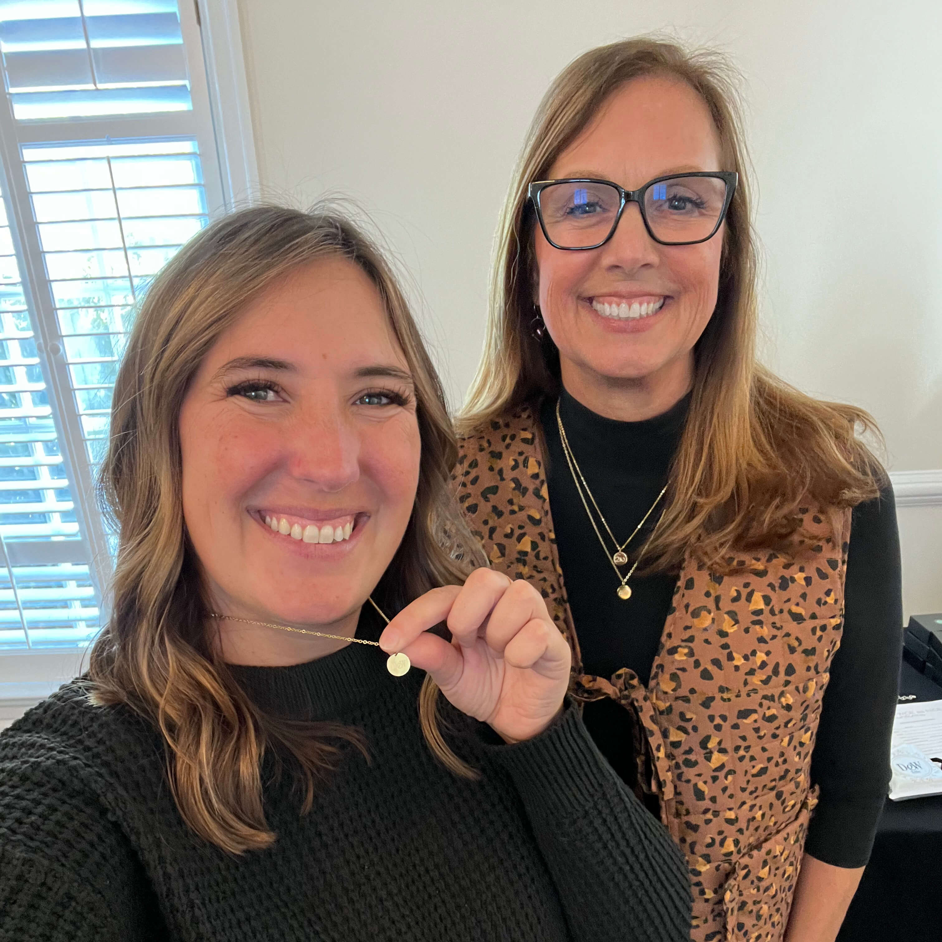 Vanessa and Debora with custom necklace
