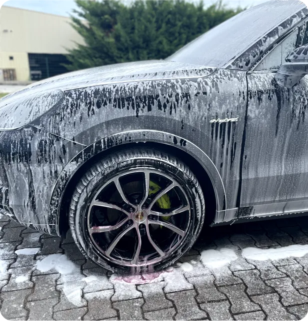 An expensive car is cleaning