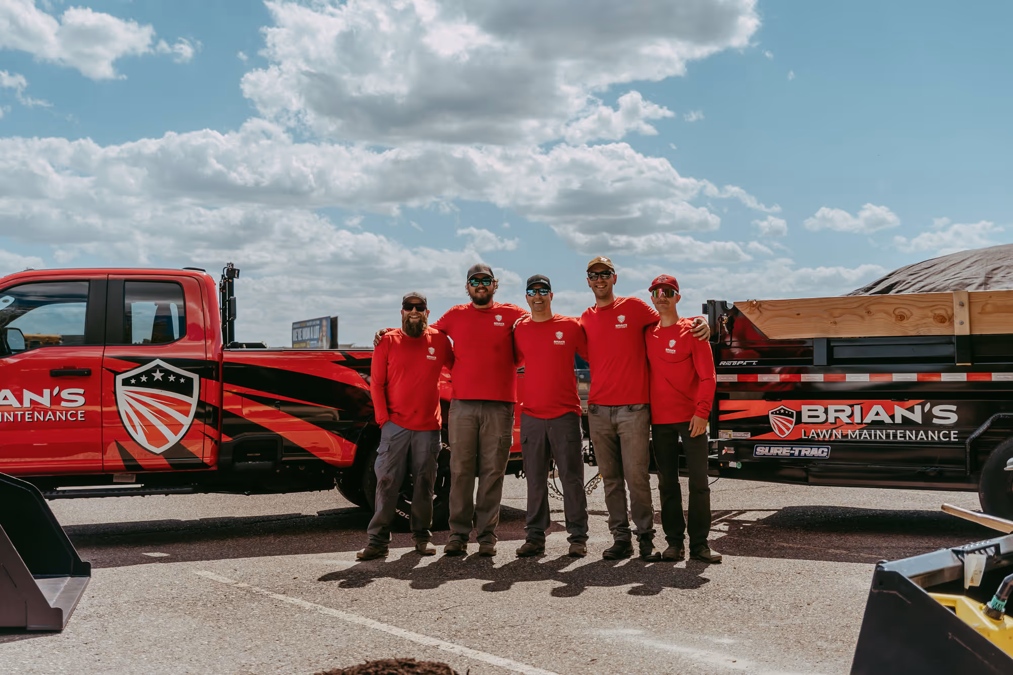 Brian’s Lawn Maintenance crew in uniform providing commercial maintenance