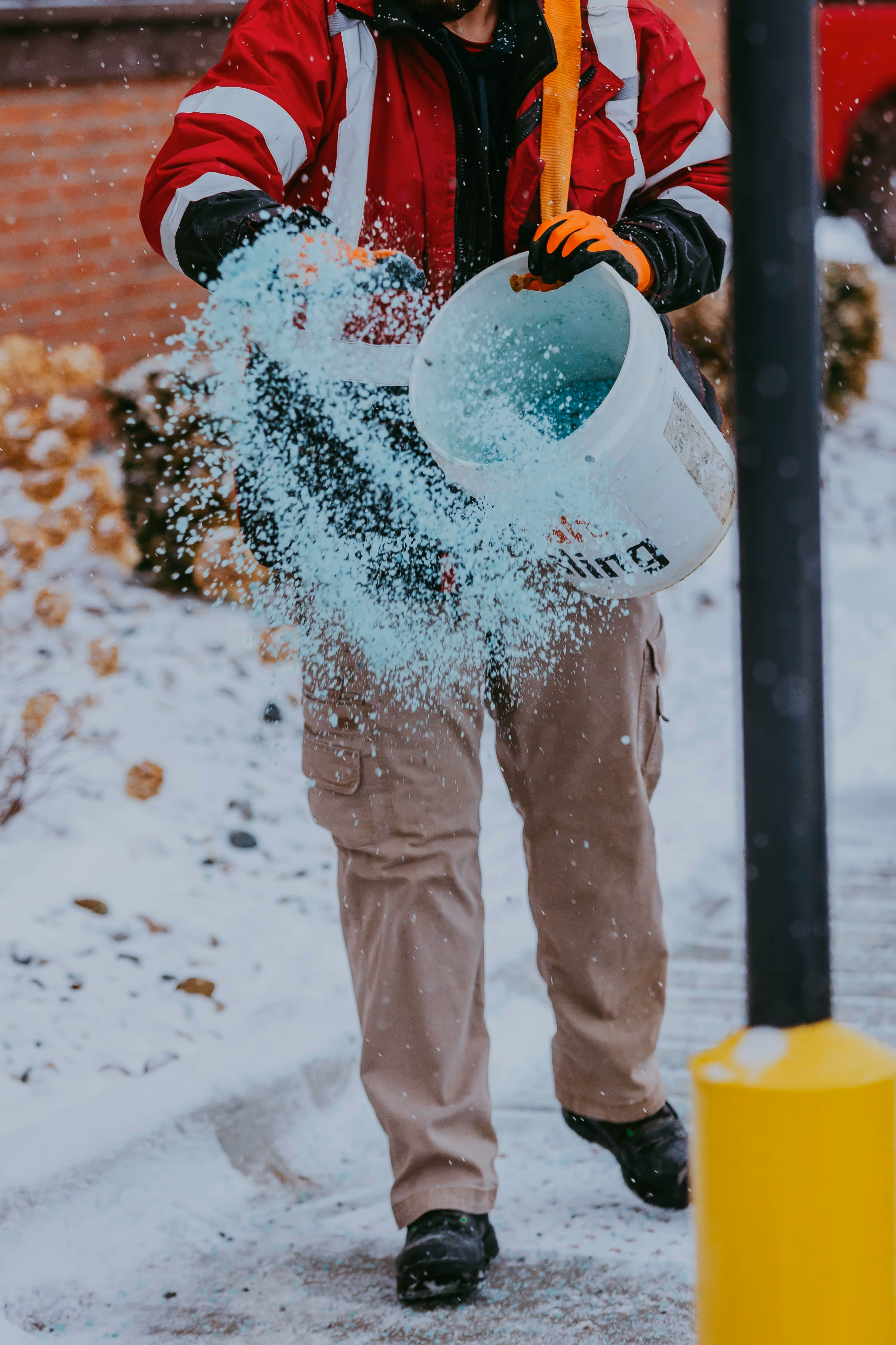 Sidewalk snow blowing and de-icing at Novi shopping center