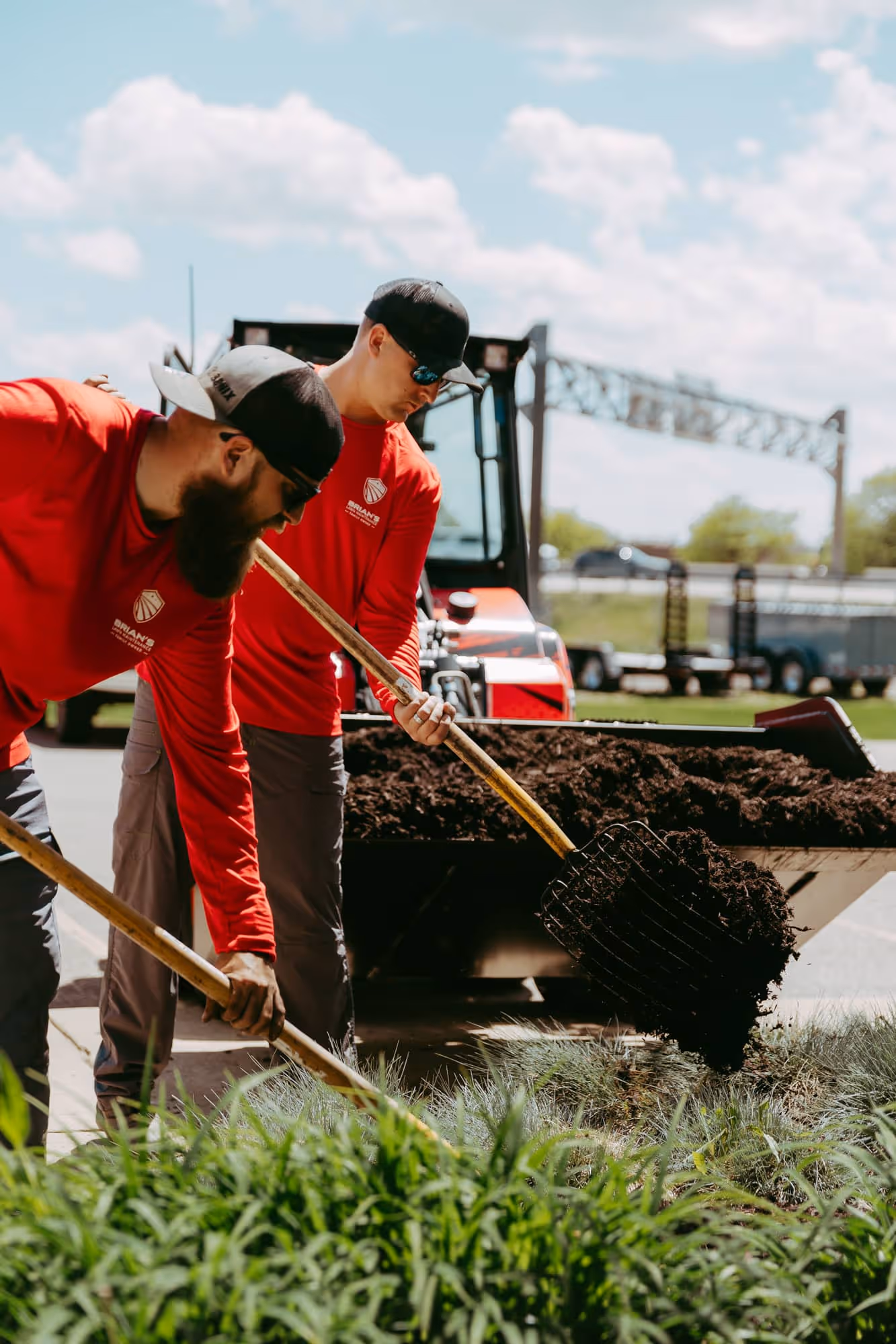 Fresh mulch installation in medical campus plant beds, Novi MI