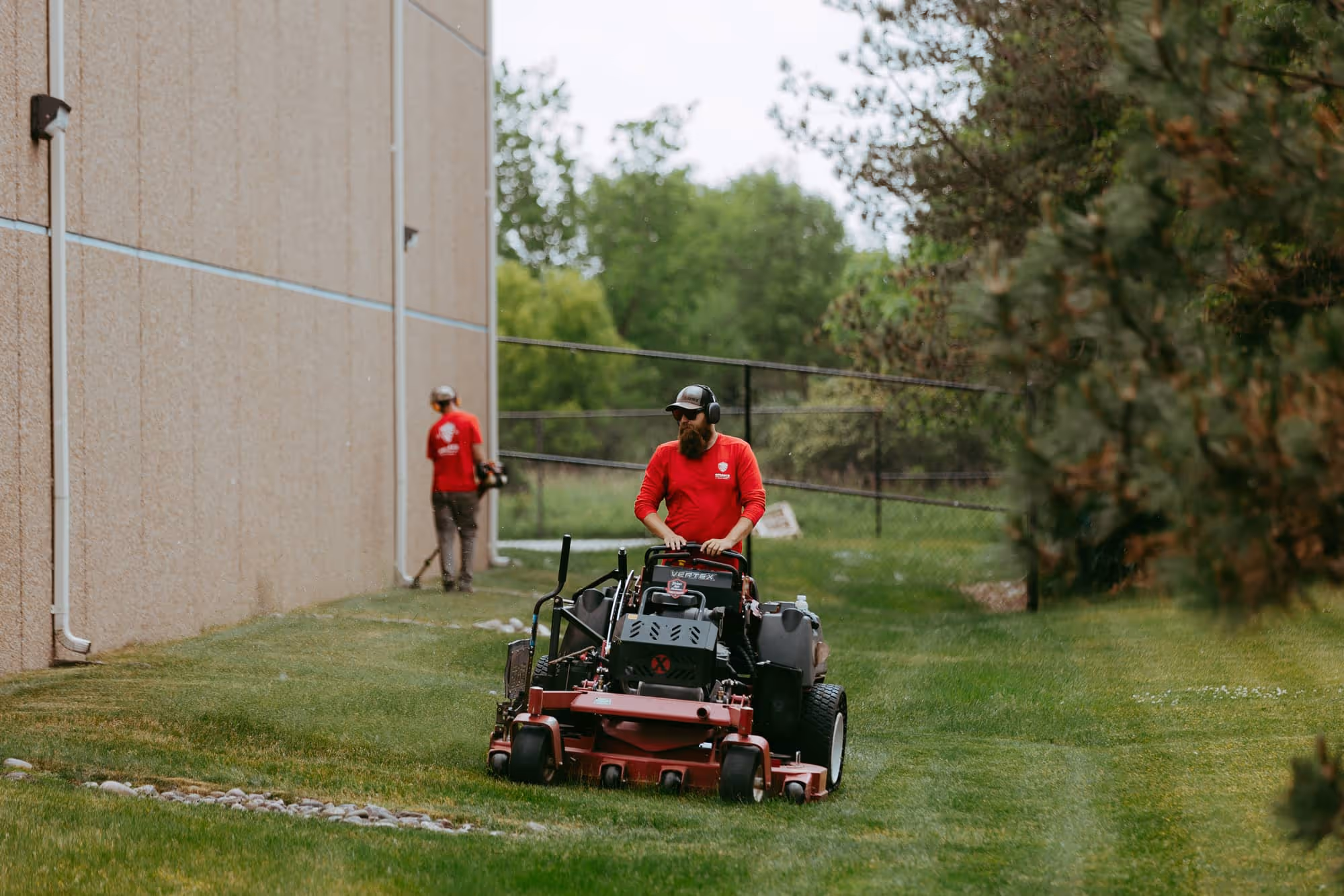 Commercial lawn mowing and edging at warehouse facility, Wixom