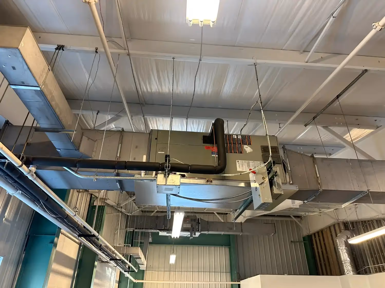 Ceiling-mounted commercial HVAC system in Durham, NC | Temperature Control Services Inc.