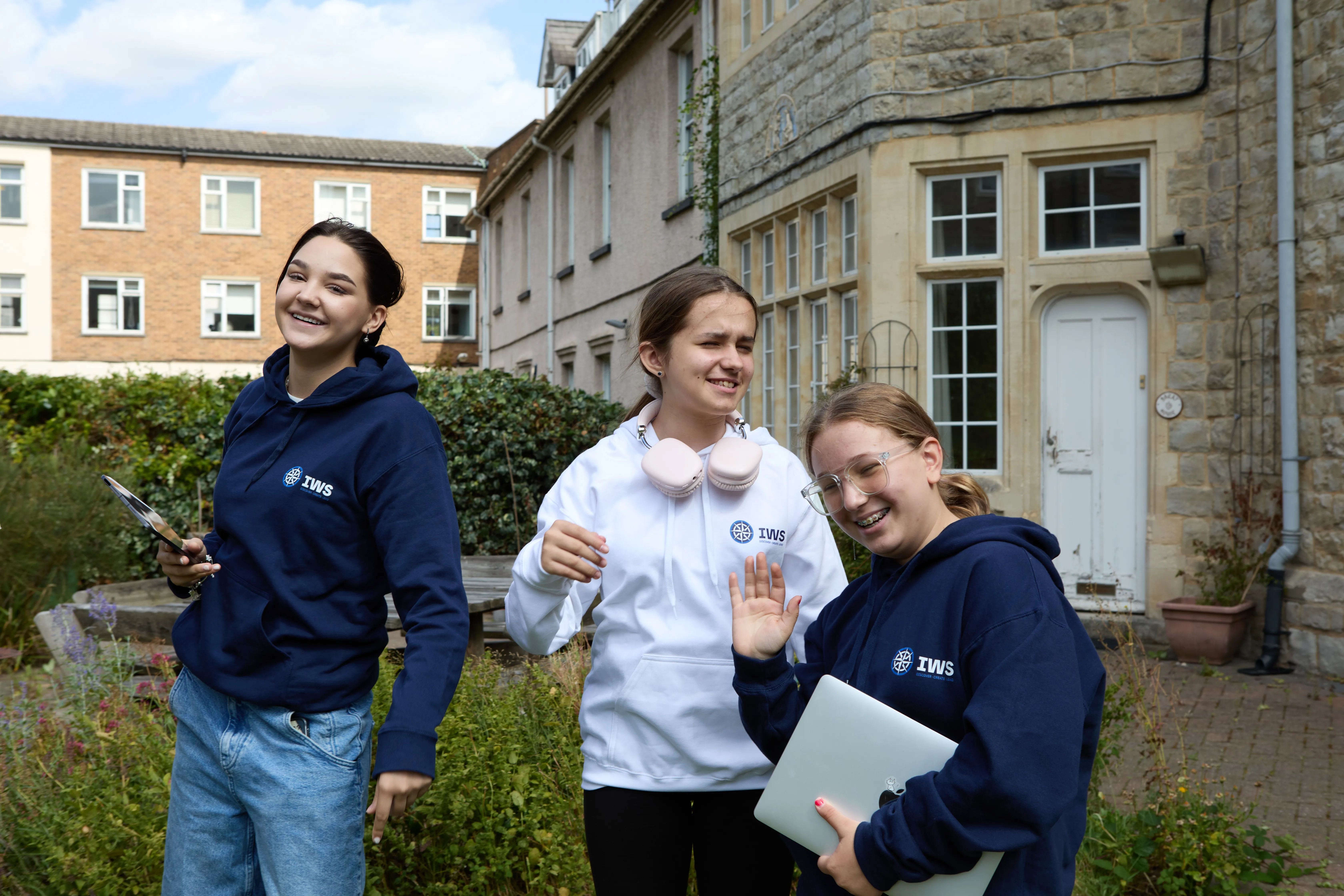 IWS Online School students interacting who studies A Levels, IGCSE, Primary, Lower Secondary online education