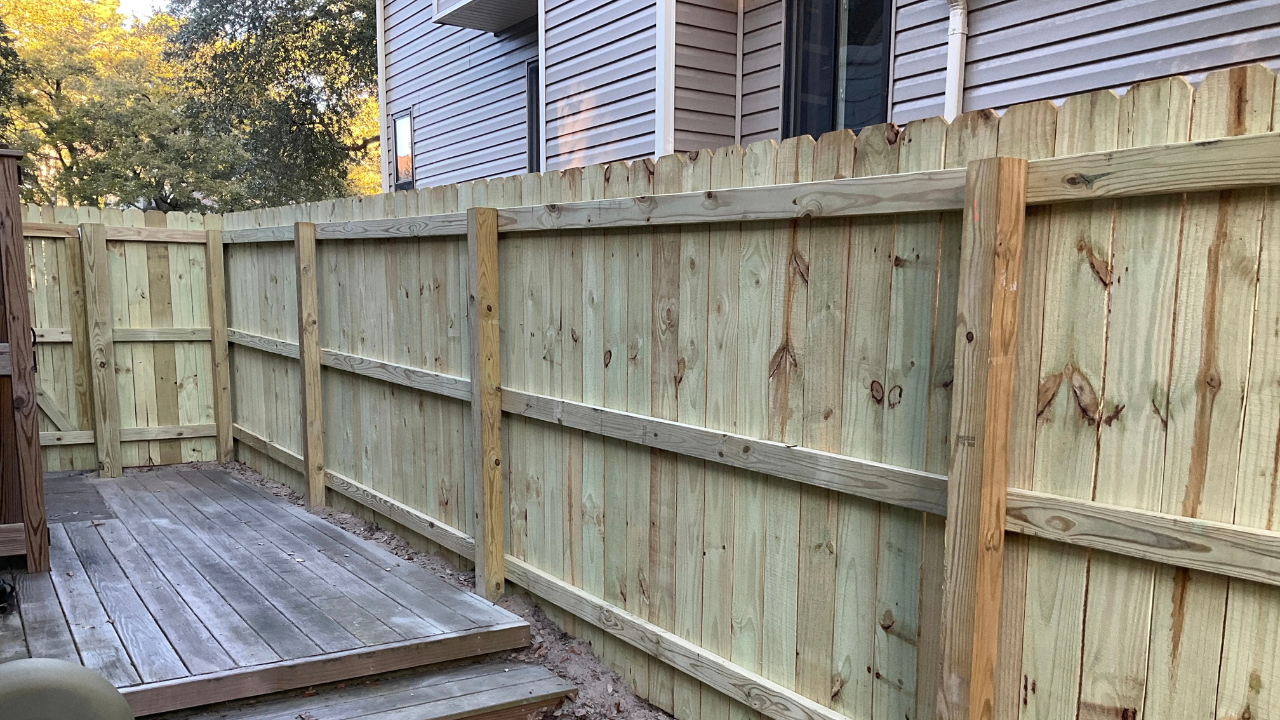fix rotted fence post