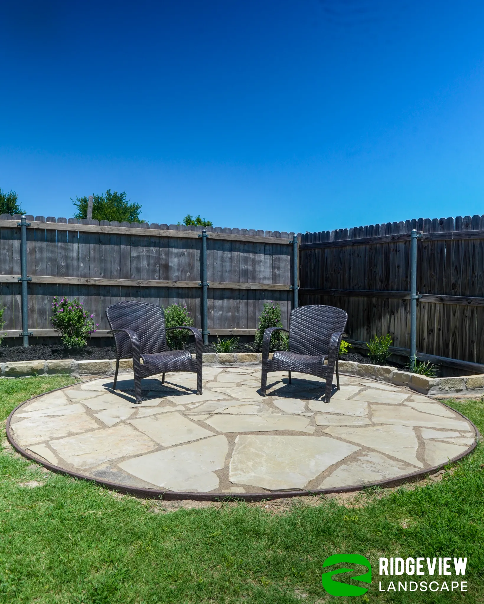 Landscaping company in Mansfield, TX consulting with a homeowner