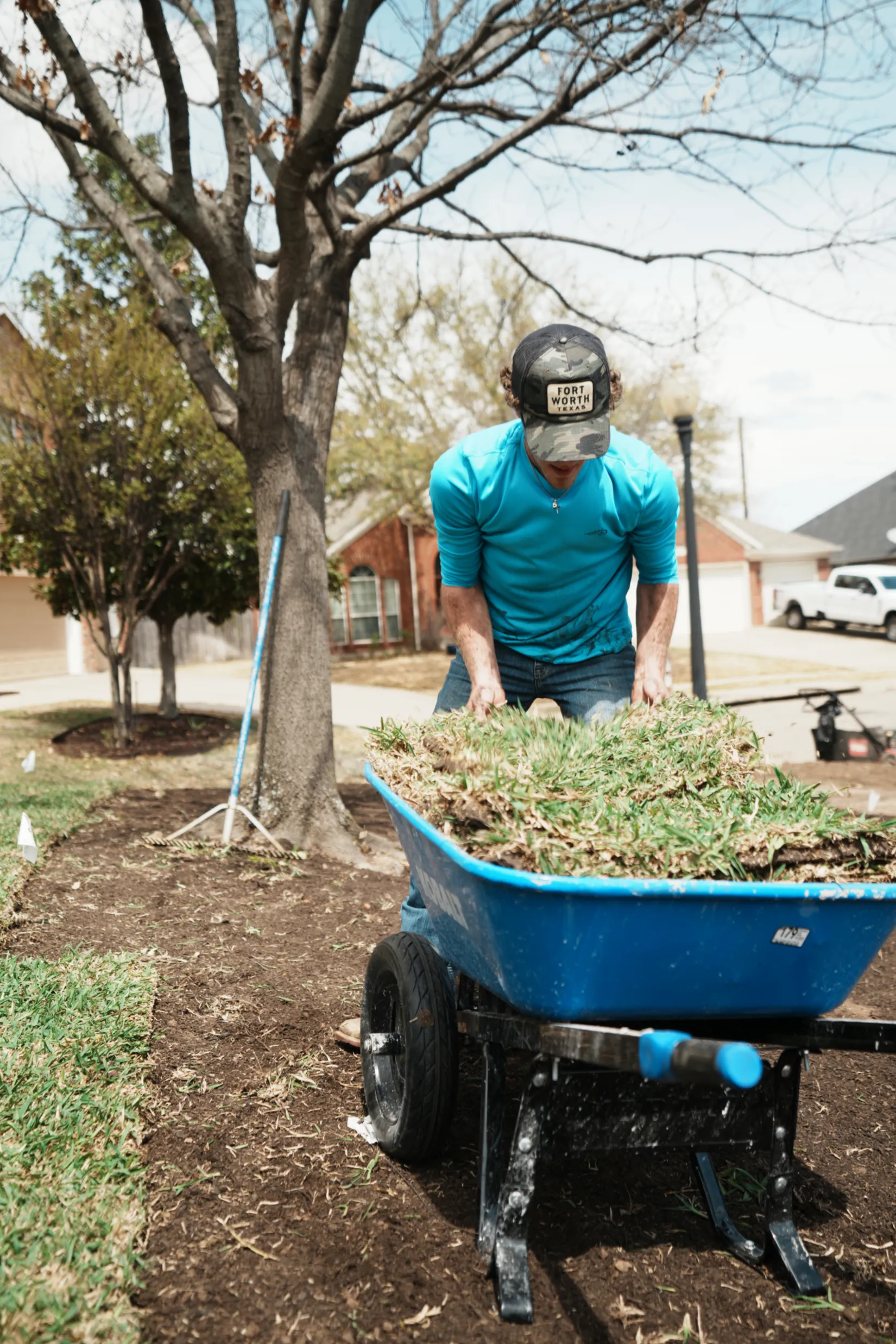 Sod installation project in Mansfield, TX with fresh sod being delivered