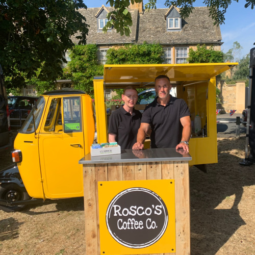 Michelle and Tom, owners of Rosco's Coffee Co stood infront of their coffee truck. 
