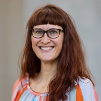 Porträtfoto von Carolin Oelsner, Unternehmenskommunikation mit ESG.