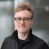 Porträtfoto von Tim Jarosch, COO.