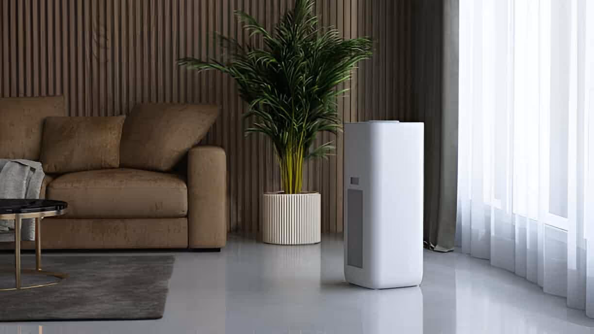 Modern living room with brown sofa, green plant, and white air purifier