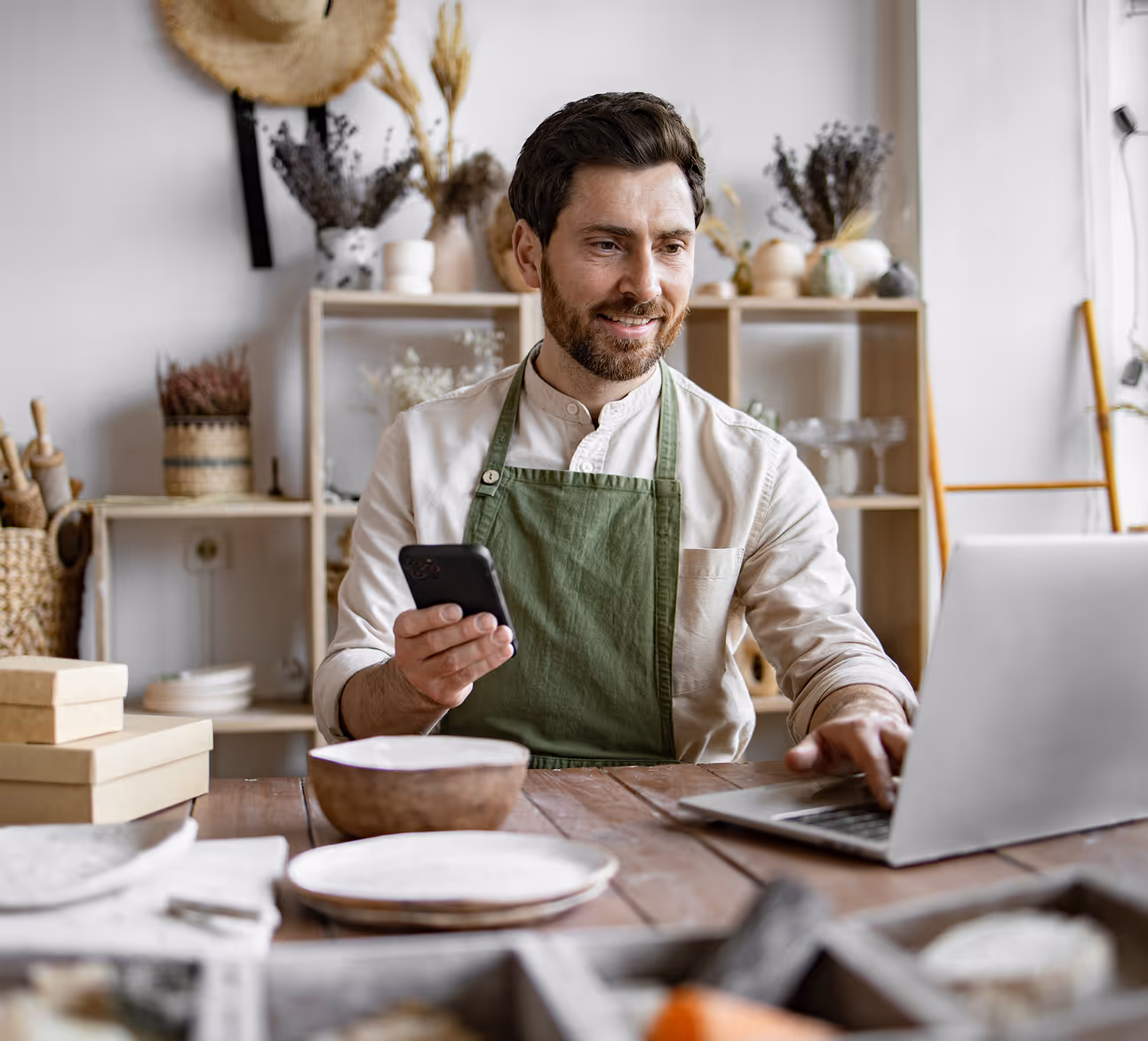 Small business owner managing his brand online, highlighting how Kicksti helps entrepreneurs increase visibility and engagement.