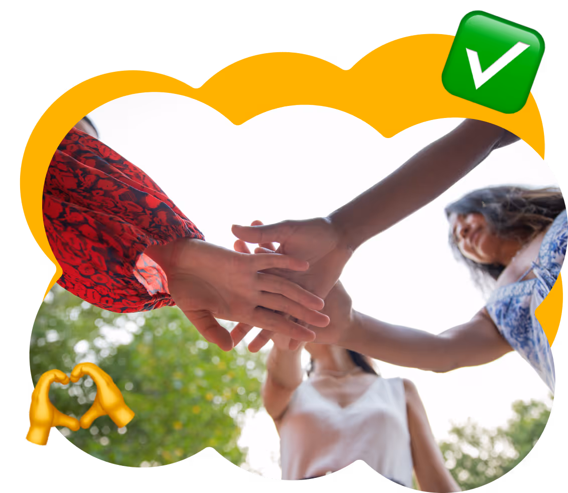 Group of women joining hands in unity, representing Kicksti’s trust-driven community building and values of authentic connection.