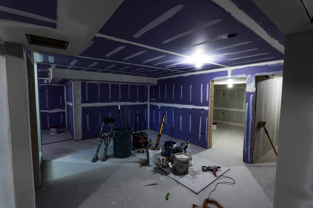 Walls and drywall prep for a Maine basement renovation project