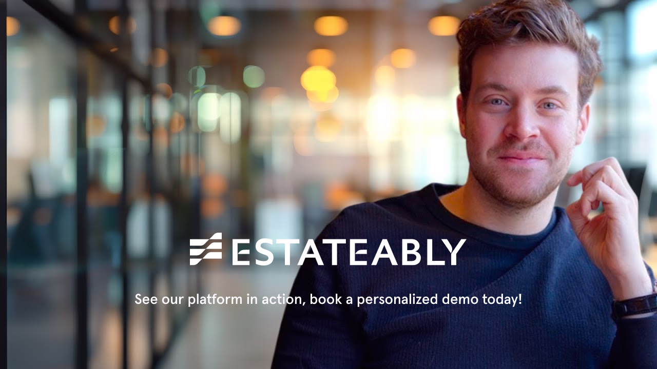 Smiling young man in a navy shirt sitting in a modern office with the Estateably logo and text inviting to book a personalized demo.