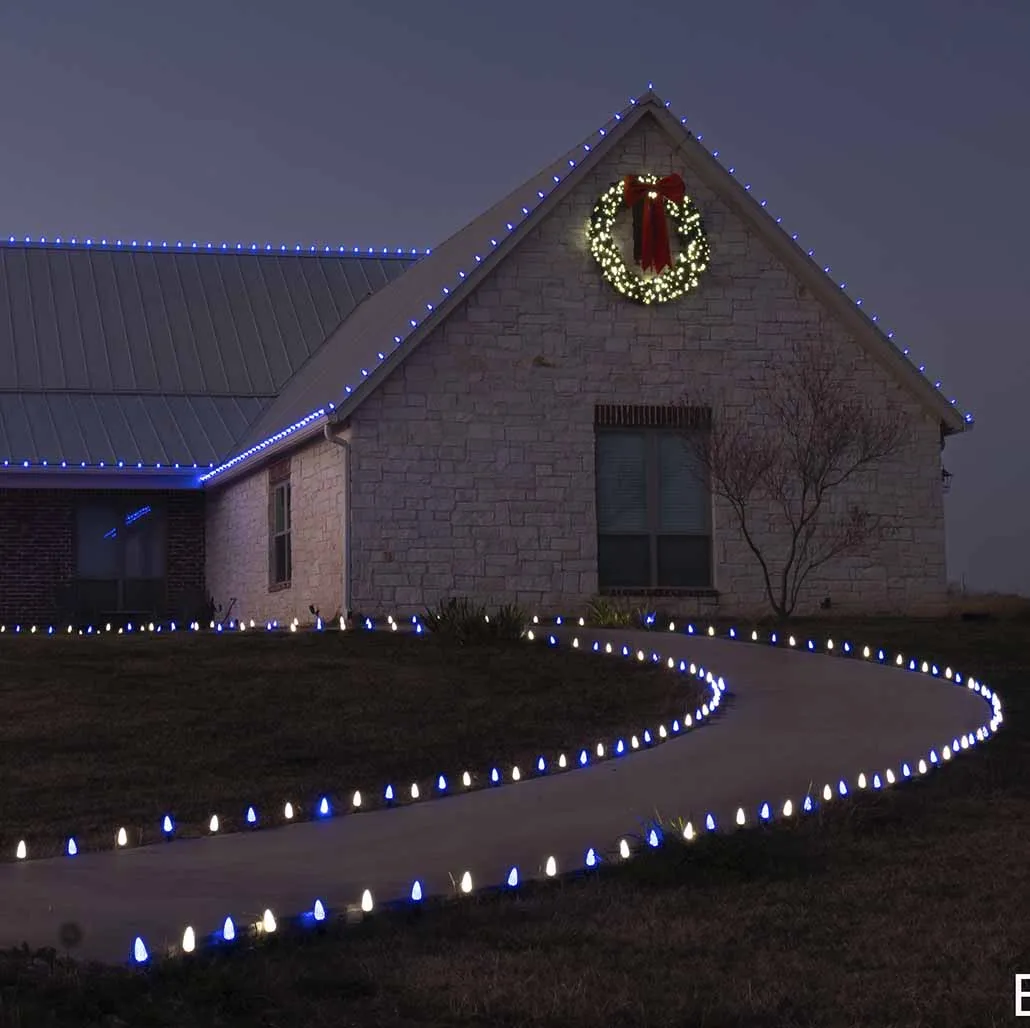 Professional installers hanging Christmas lights