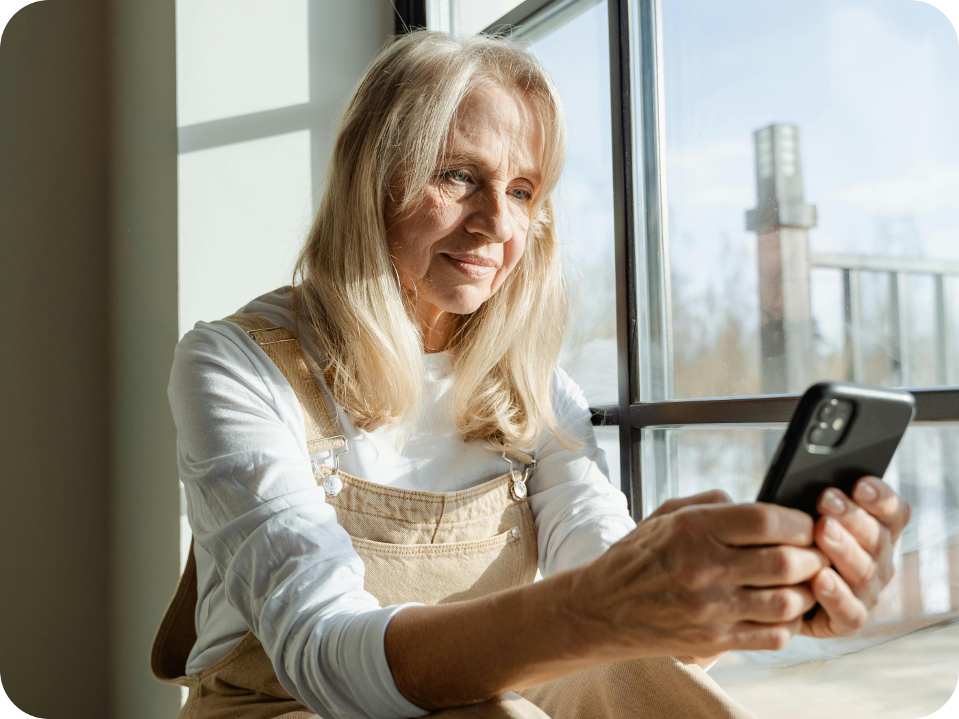 A woman looking at her phone