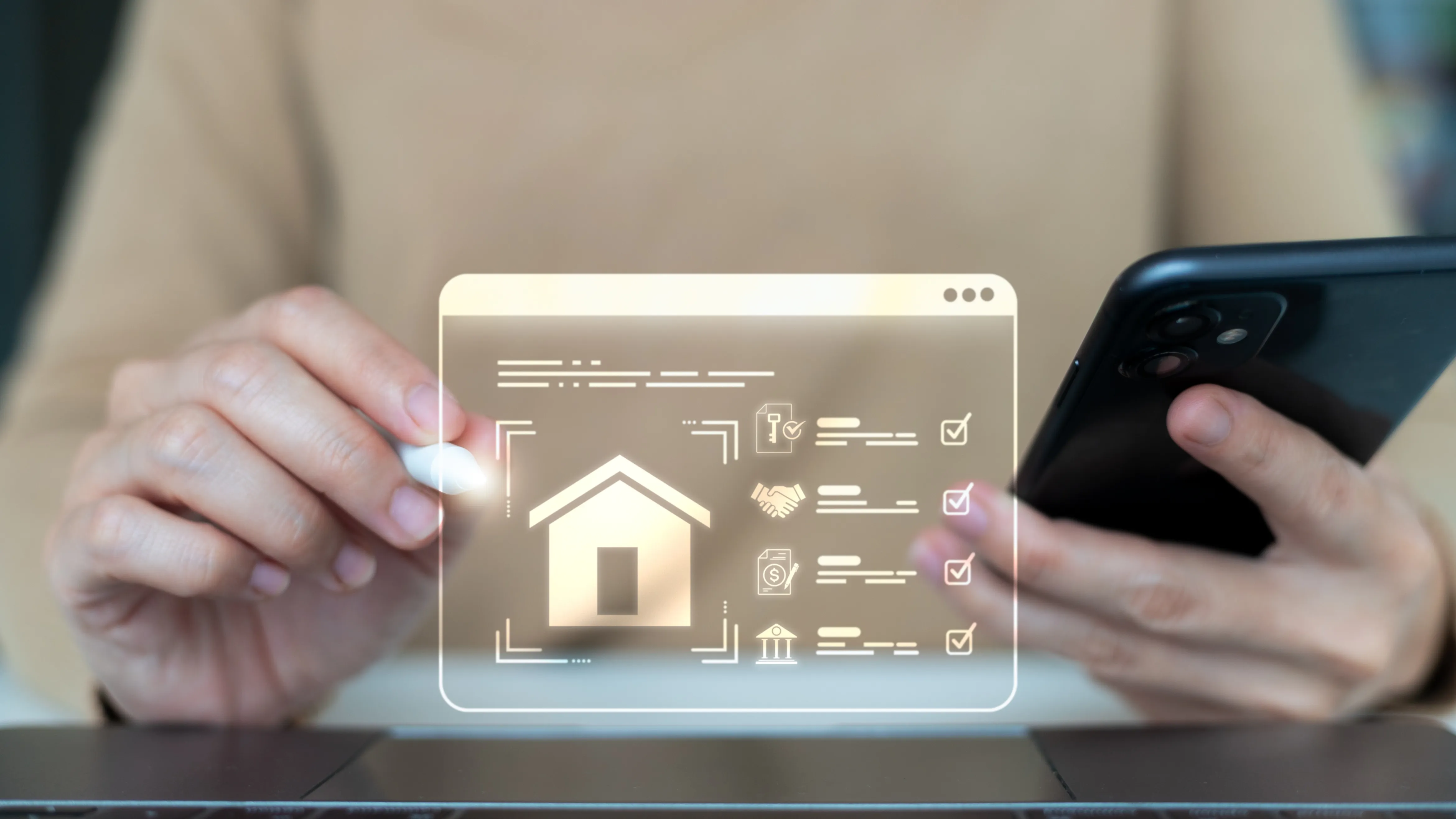 Hands holding stylus and smartphone with a digital house icon and checklist overlay above laptop.