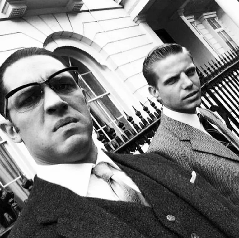 Tom Hardy wearing retro-style Solamor sunglasses for the film "Legends," directed by Brian Helgeland in 2015.