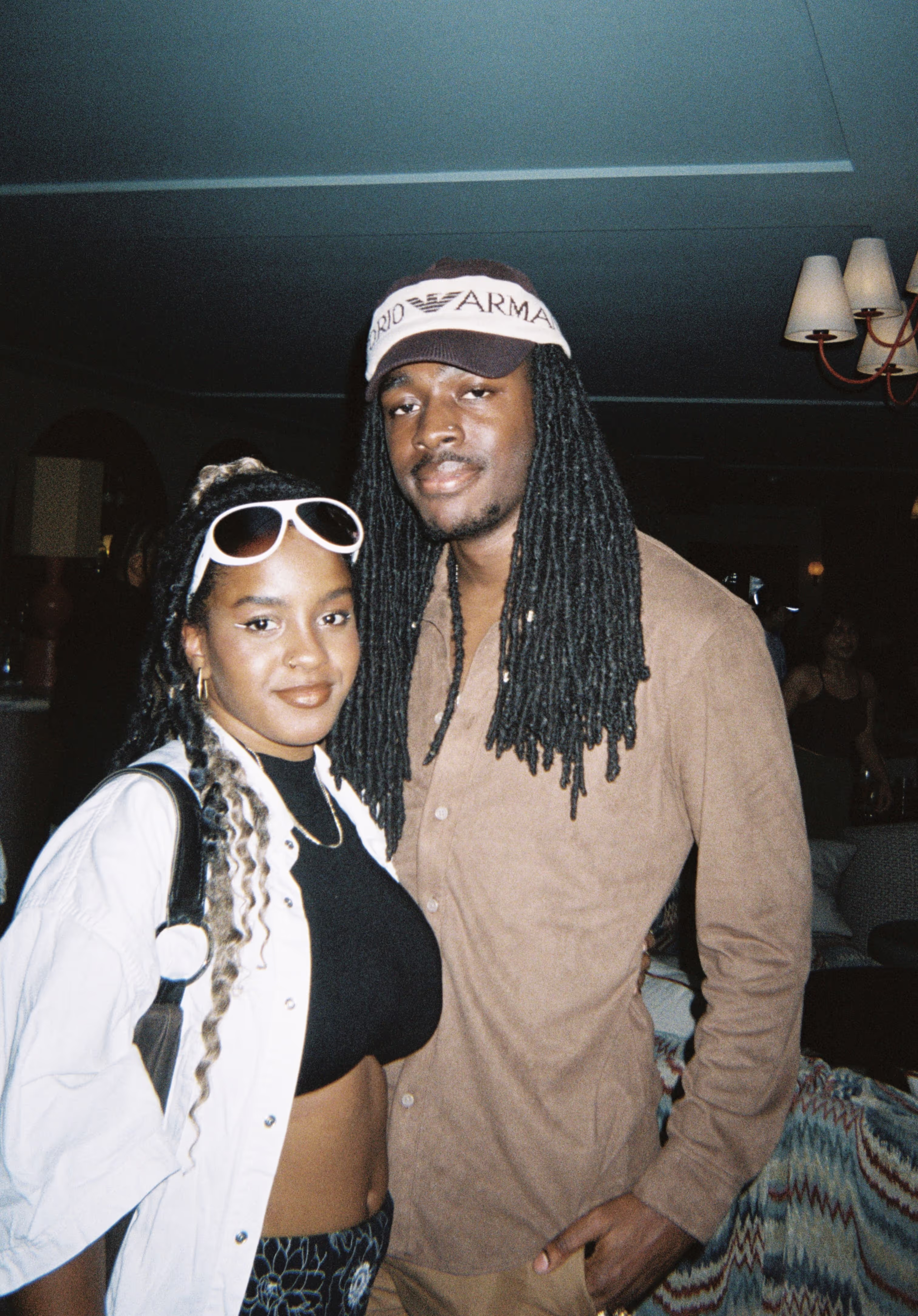 A young couple posing at the Soirée's event in Brighton, UK