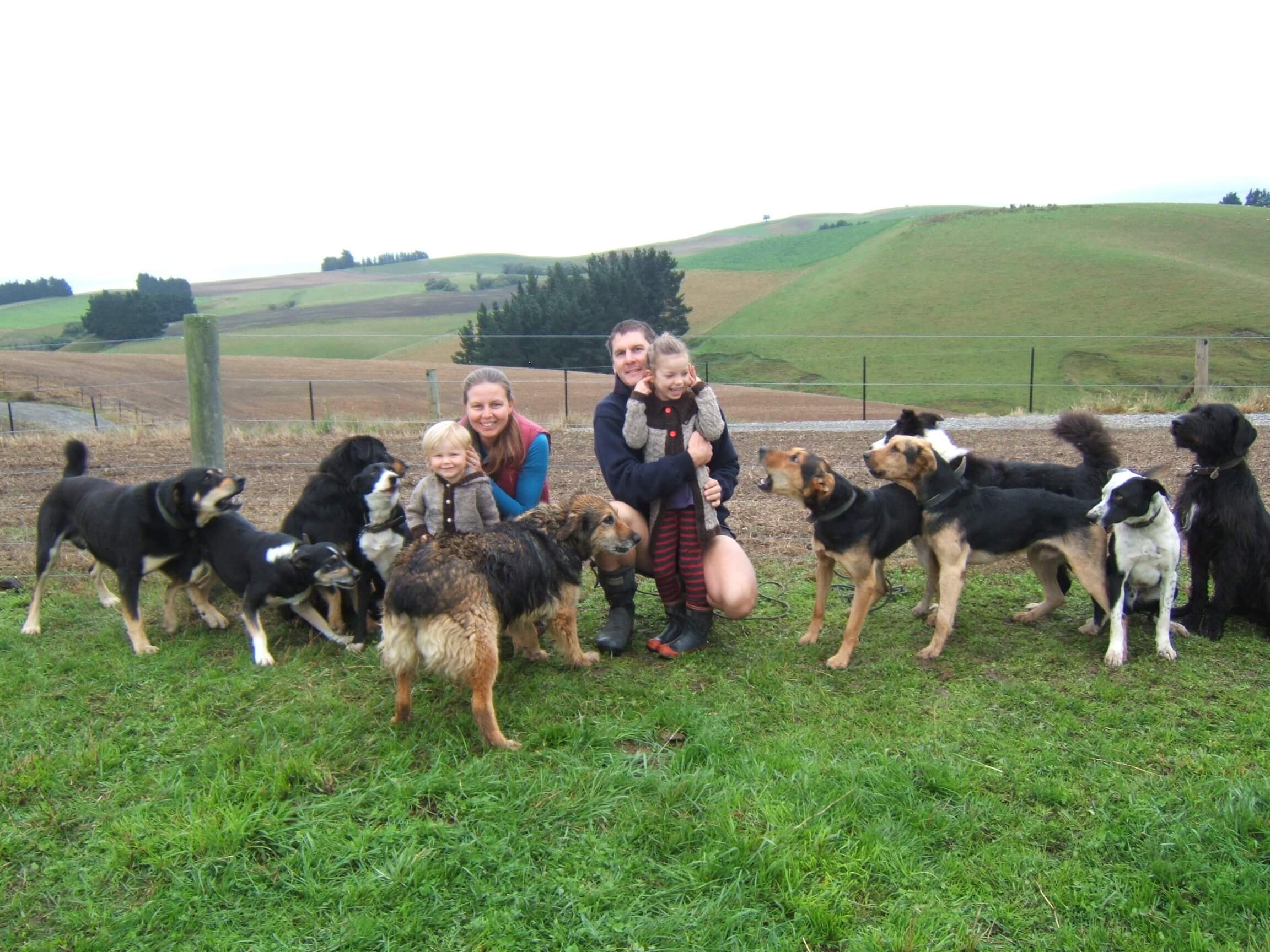 Roger Johnson from Amua on a farm with family and dogs.