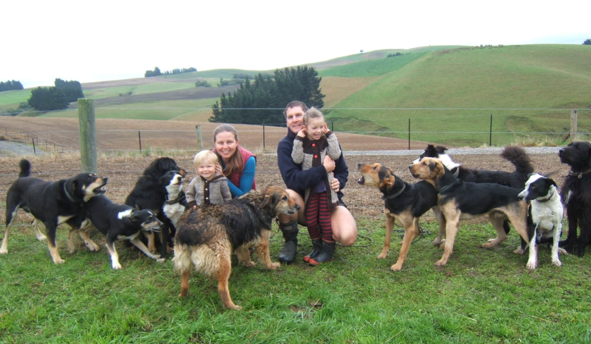 Roger with family and dogs Amua slider image
