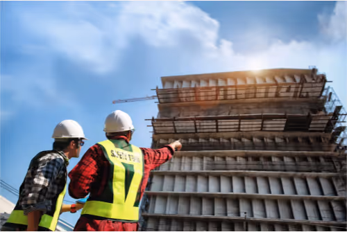 Illustrated banner for Wonderstruct newsletter ‘Breaking Down the Big’ with bold typography and imagery of construction