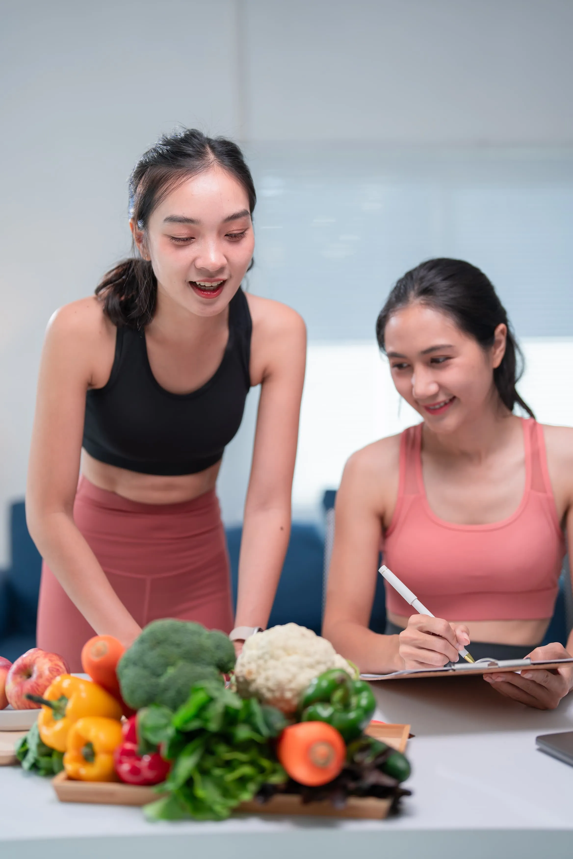 Two women making a diet plan
