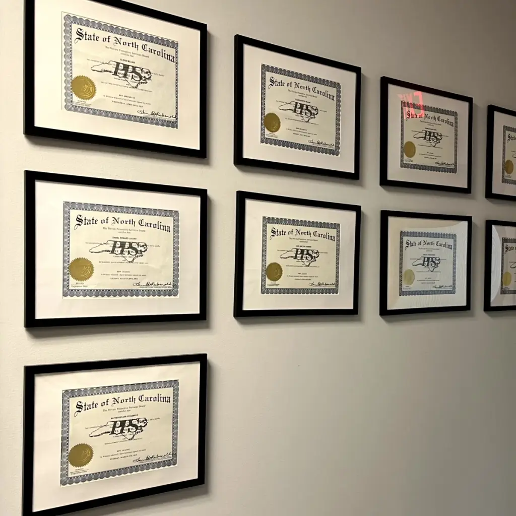 North Carolina Private Protective Services Board licenses displayed at Davis & Forest Investigative Group, showing active certification for private investigators