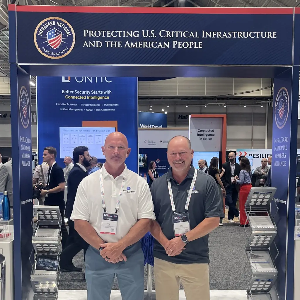 Eric Davis and Greg Forest at InfraGard National Members Alliance booth, GSX 2025