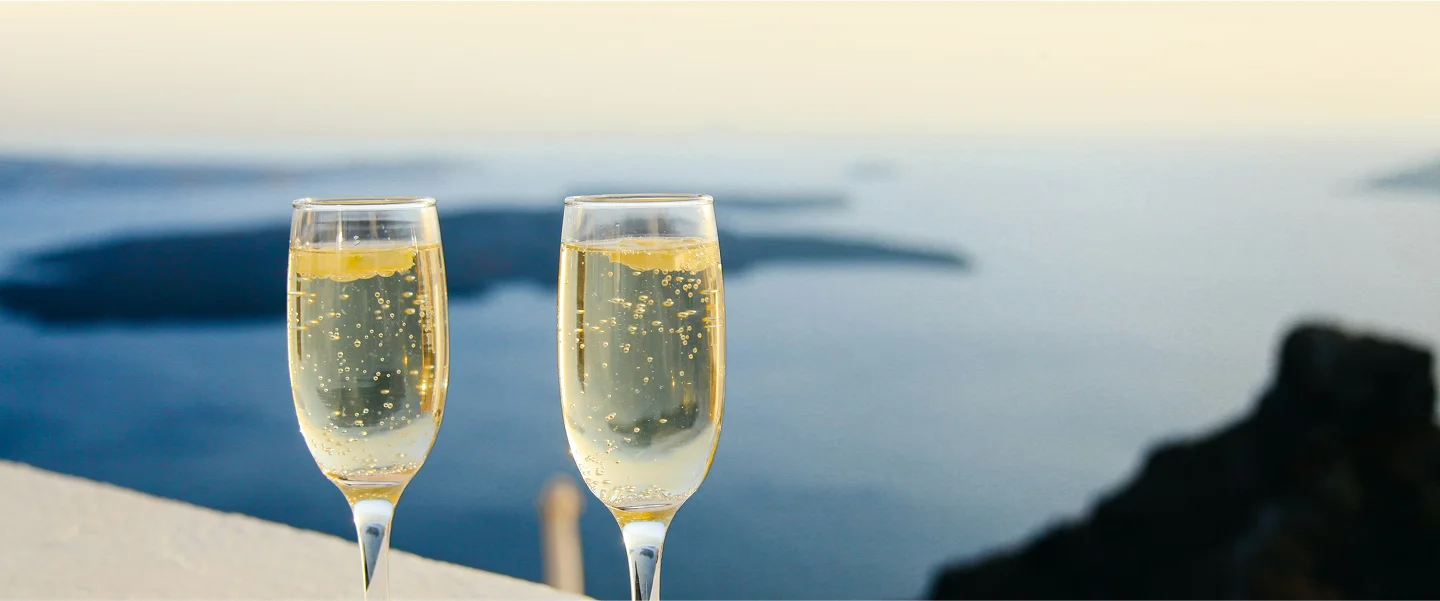 Two_Champange_Glasses_In_A_Luxury_Setting