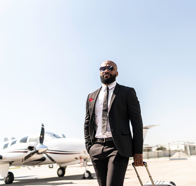 High_Net_Worth_Clientele_Walking_From_Private_Jet
