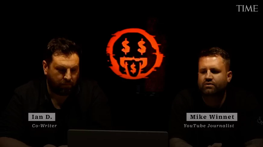 Screenshot of Mike Winnet and Ian D. being interviewed by TIME Magazine, discussing the YouTube series exposing get-rich-quick schemes.