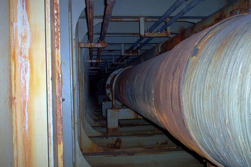 Section of badly worn ballast pipe wrapped with UPS Composite Wrapping