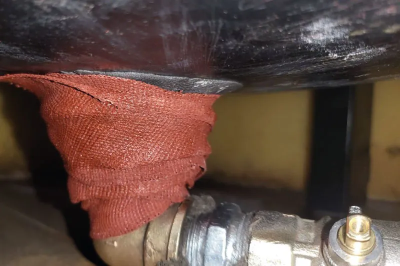 Leaking pipeline in mine ready for wrapping