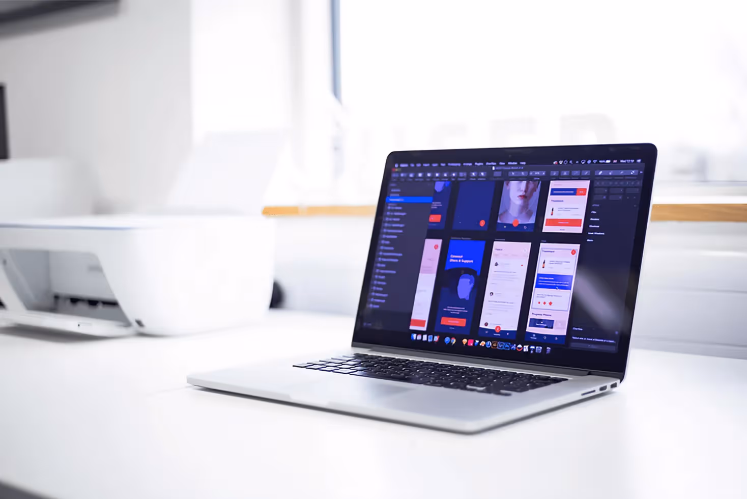 A laptop screen displaying the internal interface of an app in the design phase, showcasing the UX design and development process