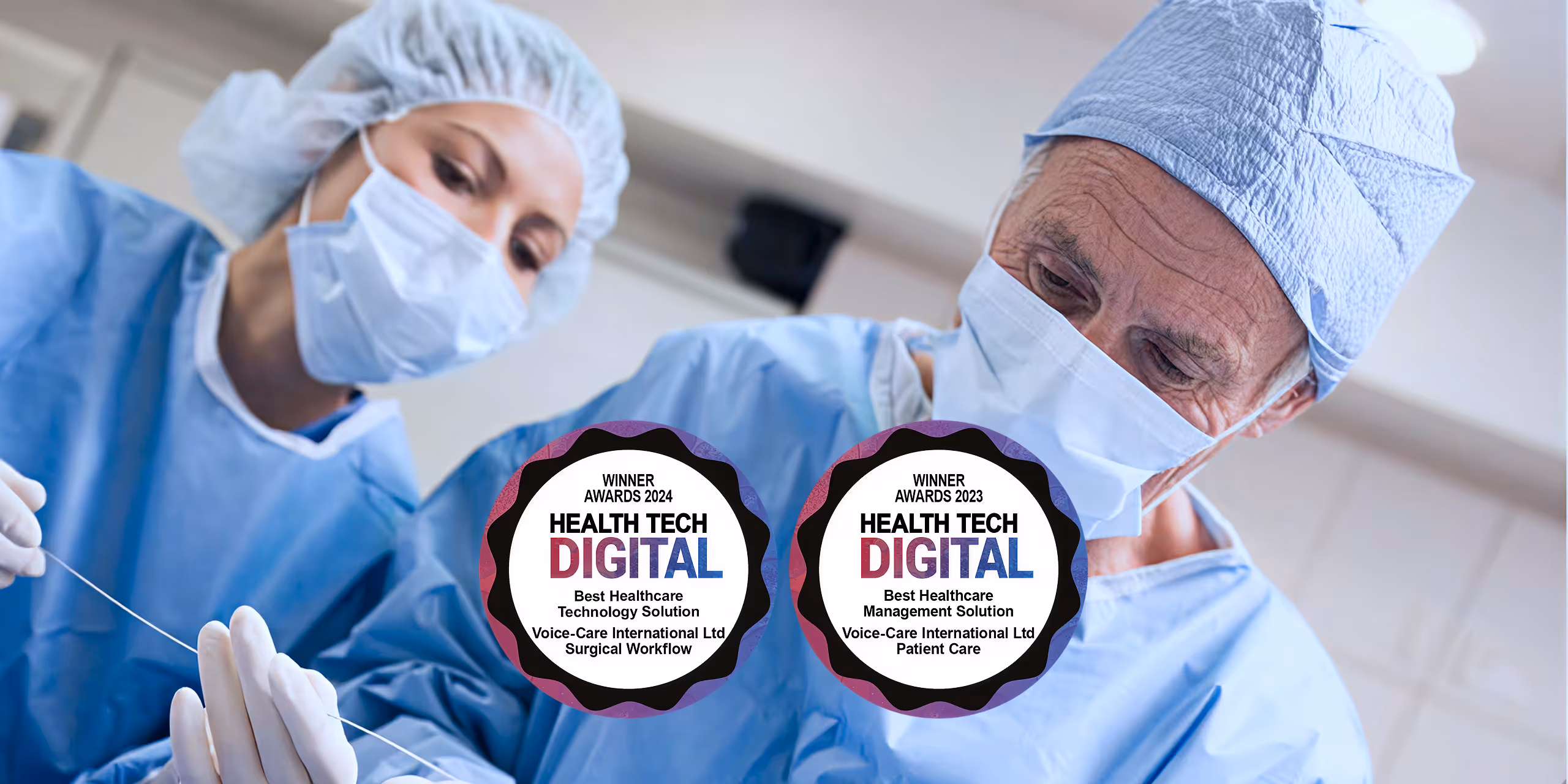 Two surgeons in masks and scrubs performing surgery with Health Tech Digital award badges displayed.